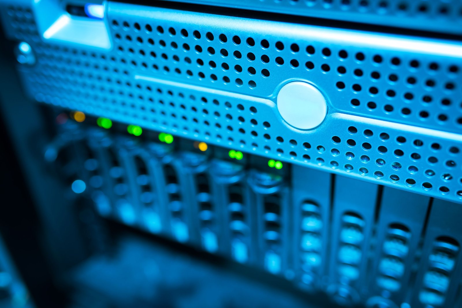 Close-up of a server with green status lights